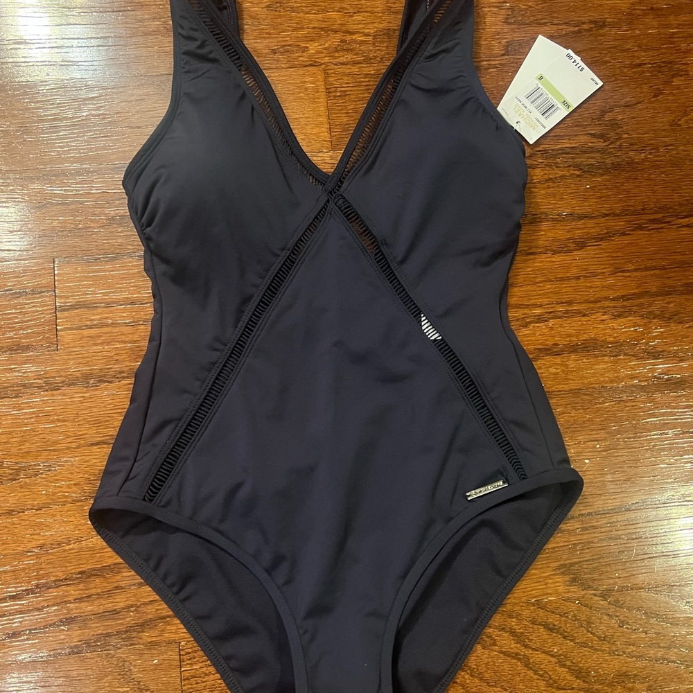Stunning yet sporty Michael Kors navy one piece bathing suit with subtle logo
